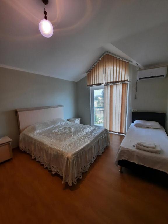 Postel nebo postele na pokoji v ubytování Delta Hotel