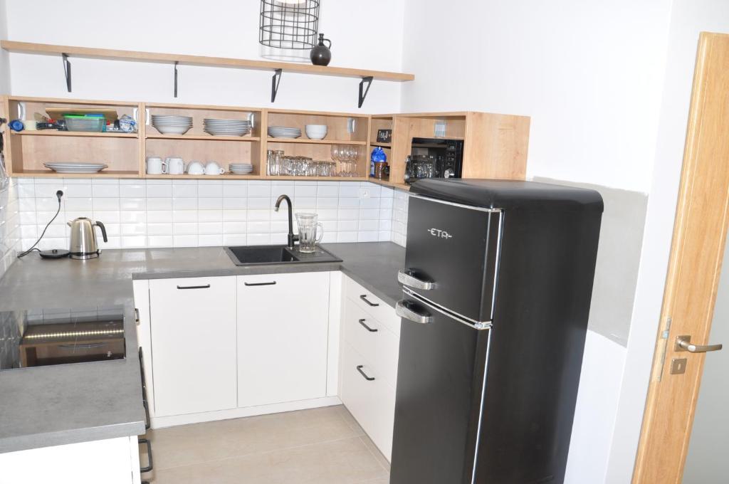 Kuchyň nebo kuchyňský kout v ubytování Apartmán Hubertus No 2