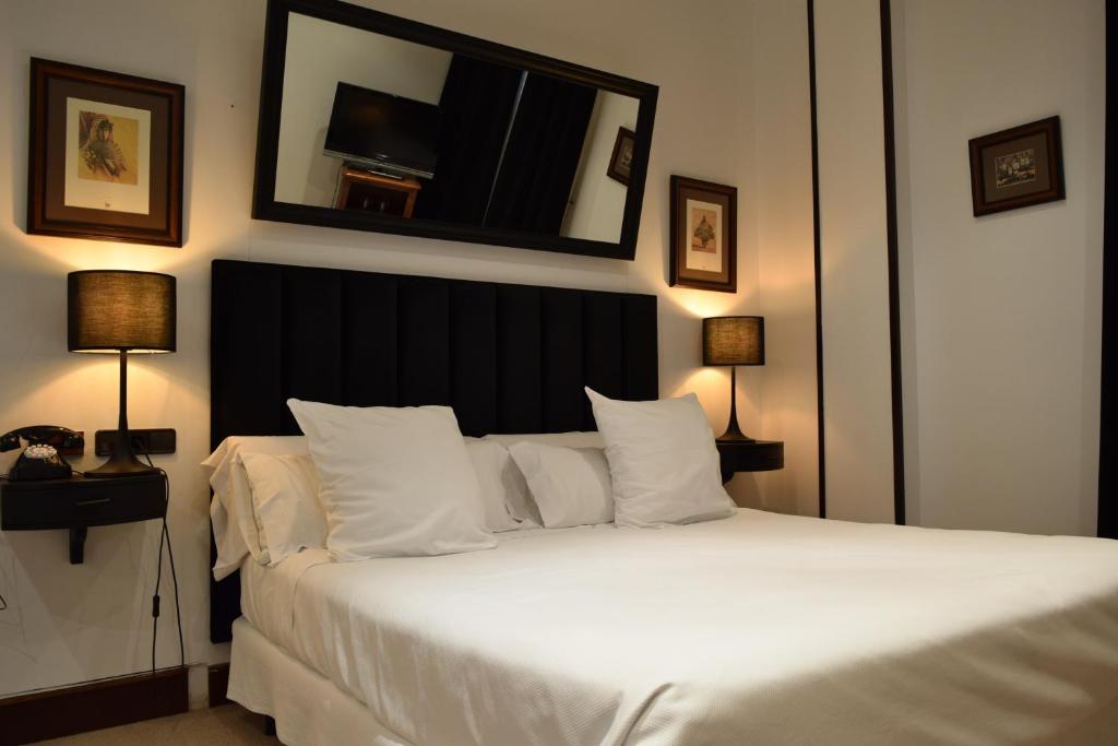 Postel nebo postele na pokoji v ubytování Hotel & Spa Arzuaga