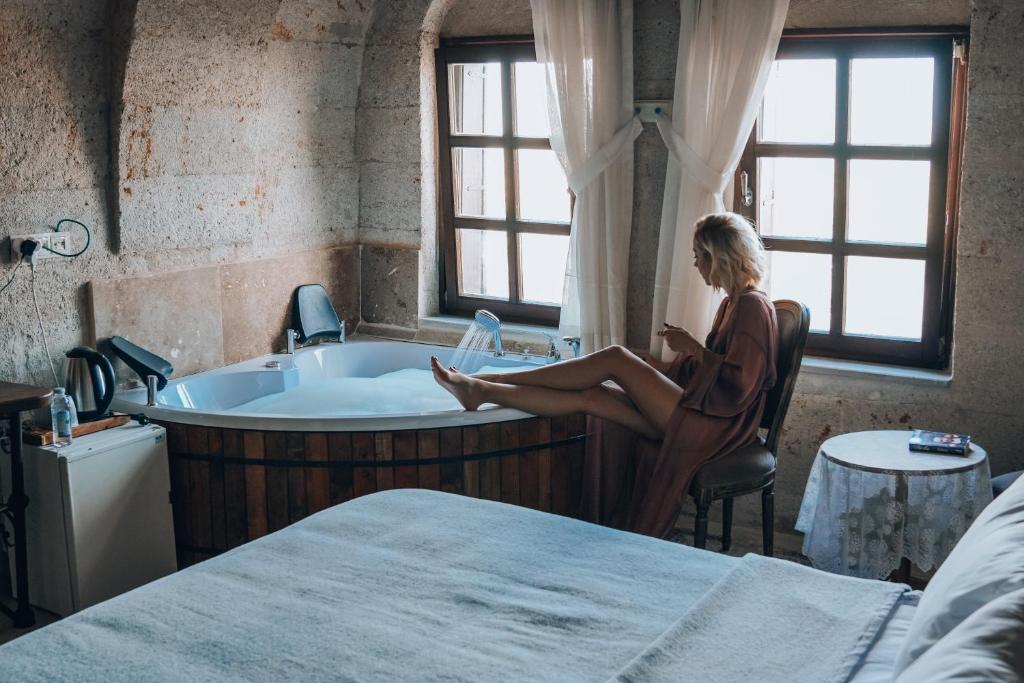 Postel nebo postele na pokoji v ubytování Karma Cappadocia