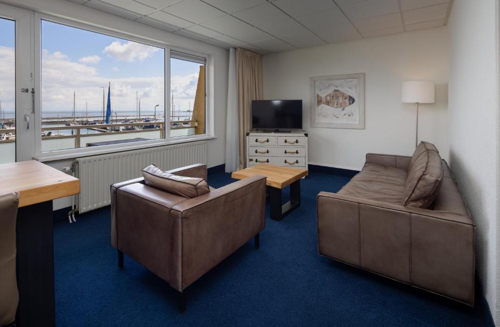 TV a/nebo společenská místnost v ubytování WestCord Hotel Schylge