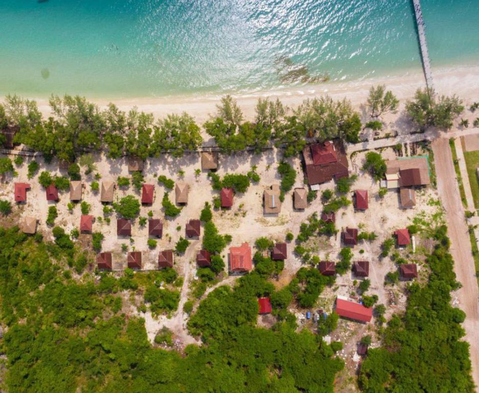 a model of a resort with chairs and trees at Pura Vita Resort in Koh Rong Island