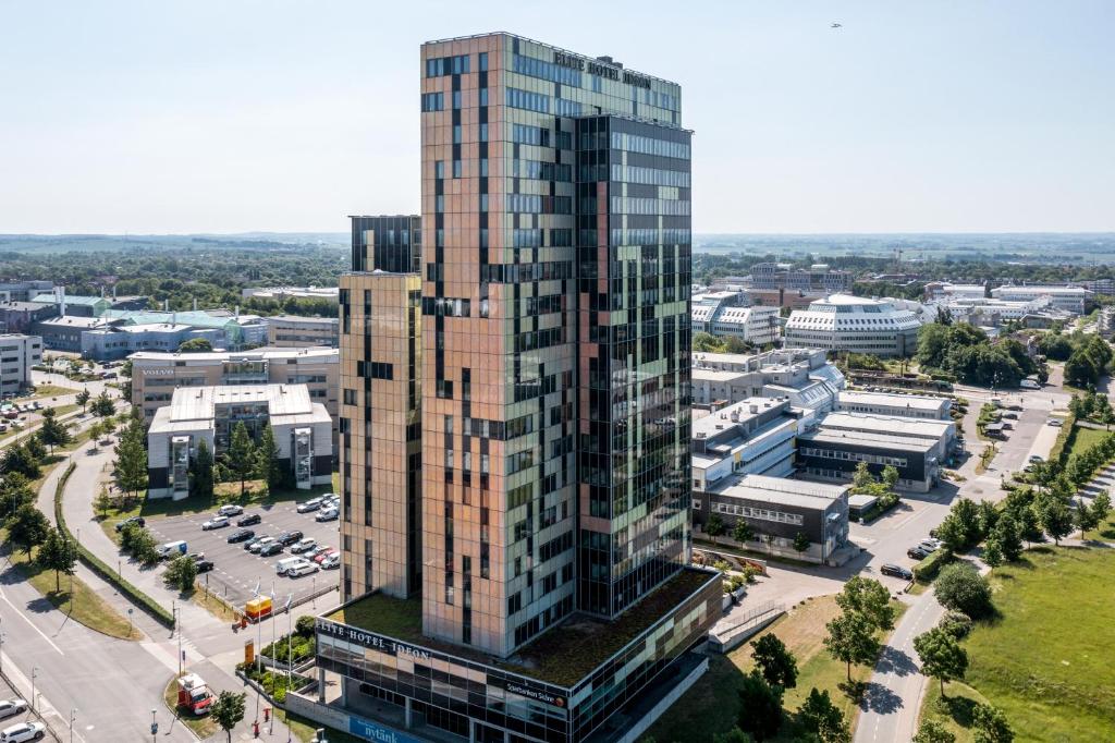 an aerial view of a tall building in a city at Elite Hotel Ideon, Lund in Lund