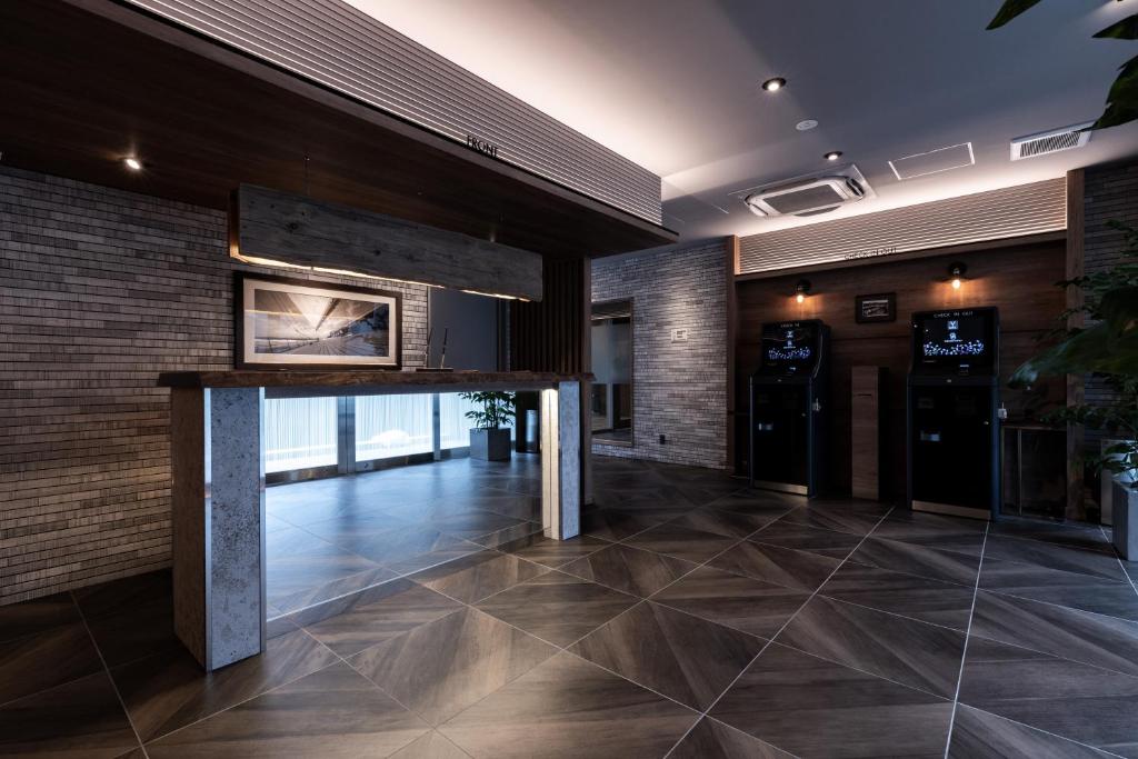 Kuchyň nebo kuchyňský kout v ubytování Y-HOTEL