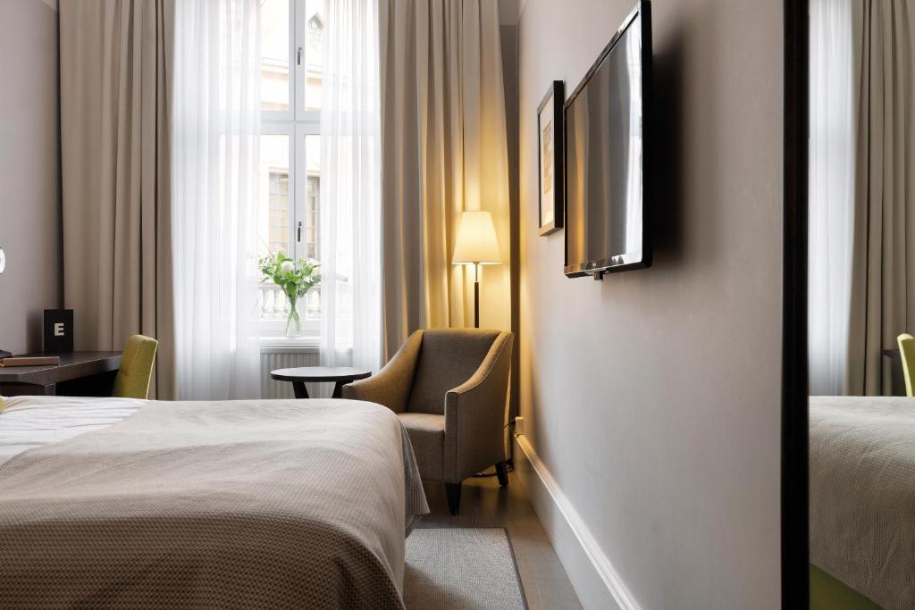 Postel nebo postele na pokoji v ubytování Elite Grand Hotel Gävle