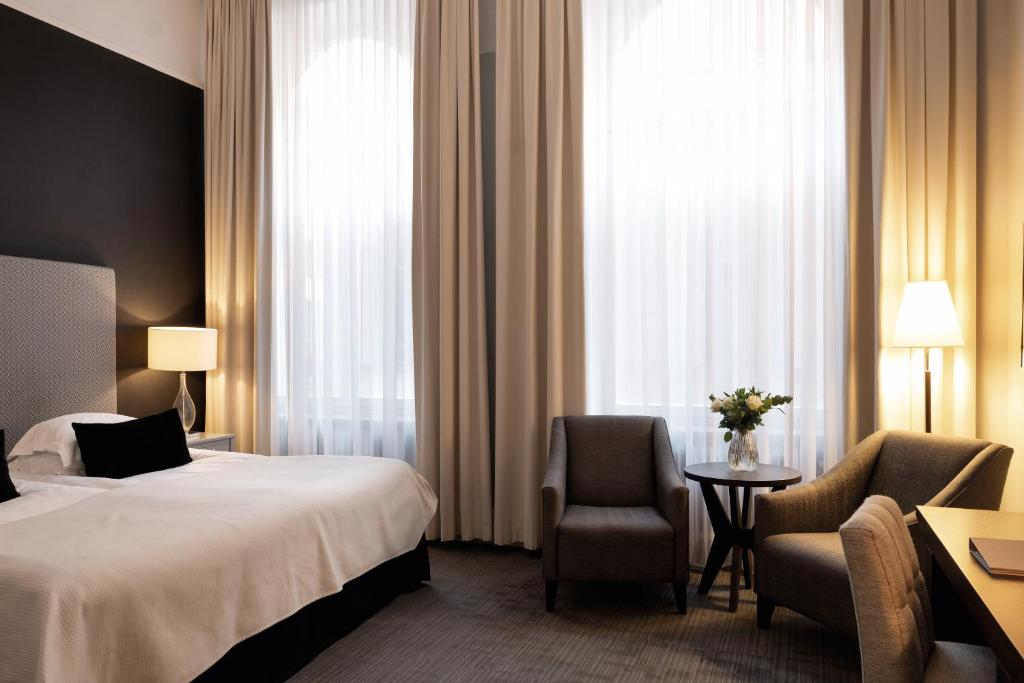 Postel nebo postele na pokoji v ubytování Elite Grand Hotel Gävle