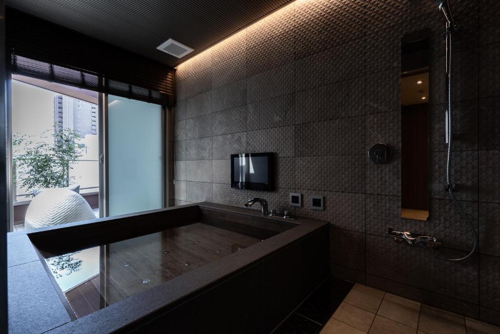 Koupelna v ubytování Y-HOTEL