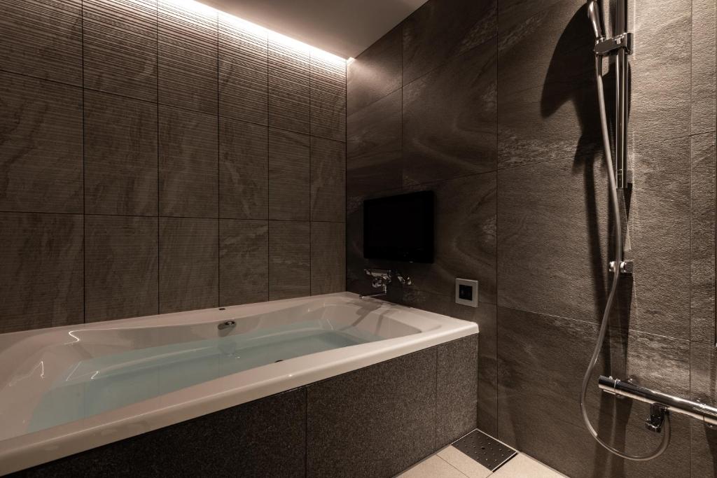 Koupelna v ubytování Y-HOTEL