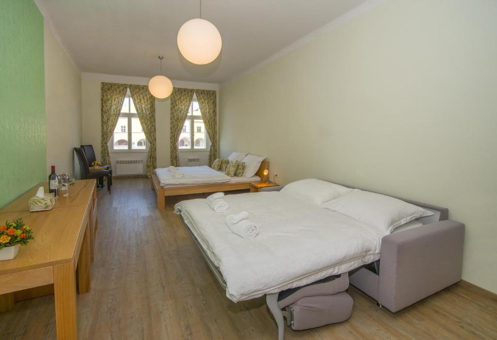 Postel nebo postele na pokoji v ubytování Hotel Anno