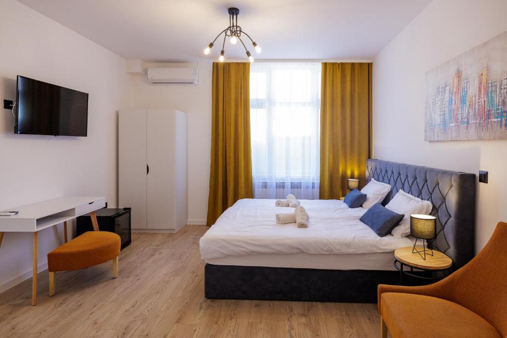 Llit o llits en una habitació de Rooms Lišnić