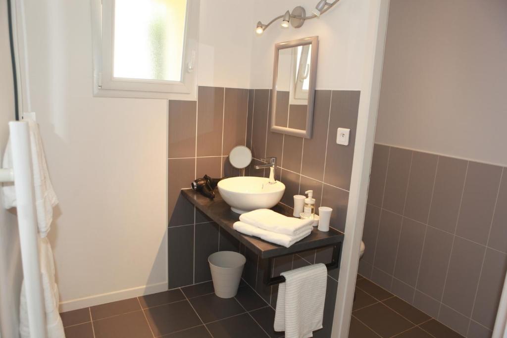 Koupelna v ubytování Chambres d'hôtes La Fontaine!