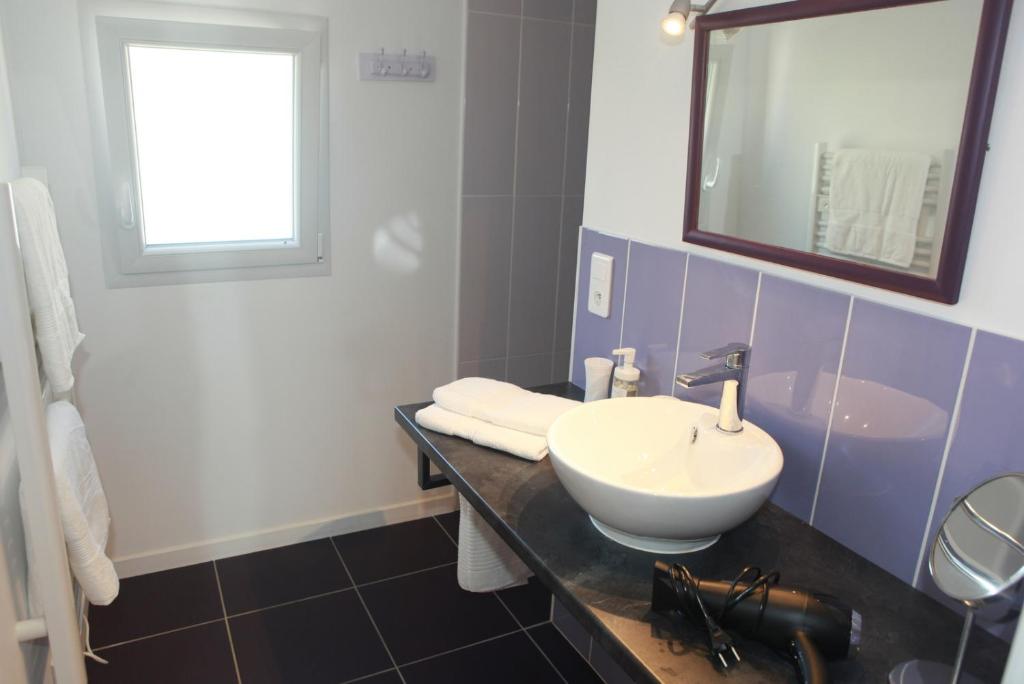 Koupelna v ubytování Chambres d'hôtes La Fontaine!