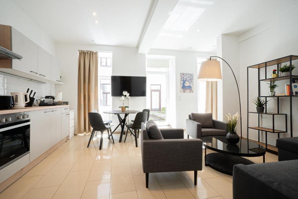 A kitchen or kitchenette at Modern and lovely apartment next to subway station