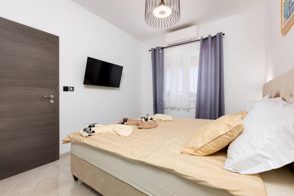 Posteľ alebo postele v izbe v ubytovaní Apartments "Two Mary"