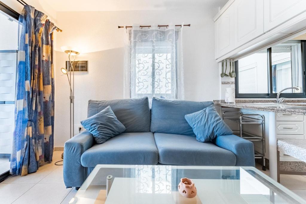 Posezení v ubytování Cosy apartment with sea view en el centro Los Cristianos