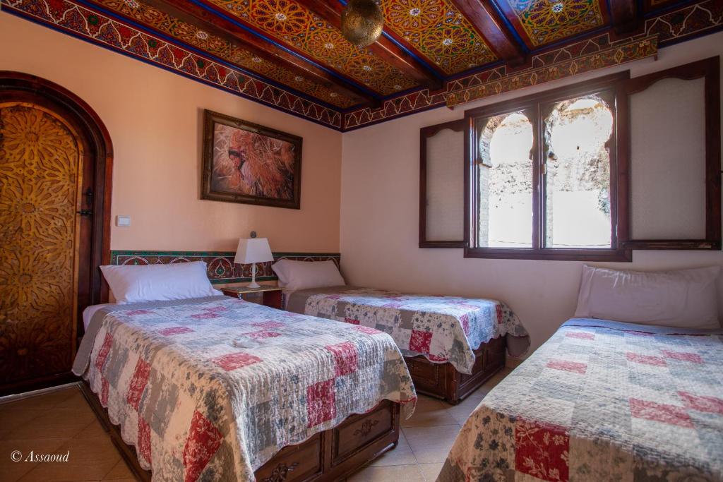 Postel nebo postele na pokoji v ubytování Hotel Chams