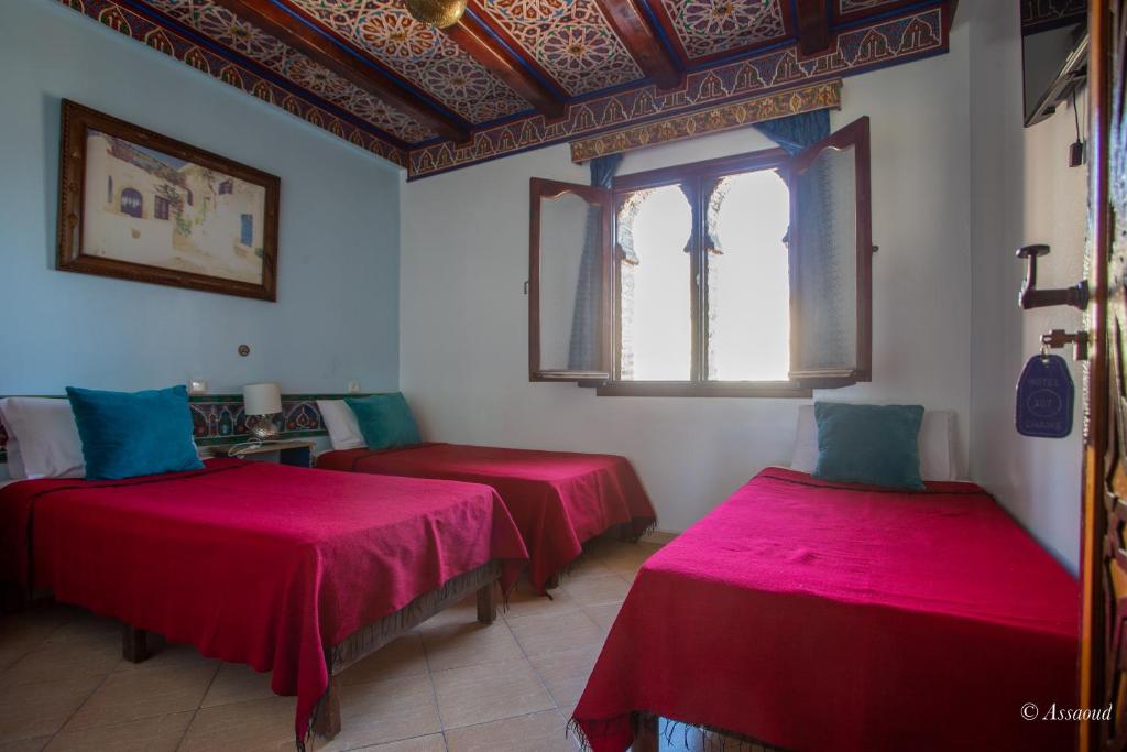 Postel nebo postele na pokoji v ubytování Hotel Chams