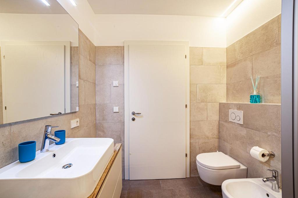 Kúpeľňa v ubytovaní Jj City Apartment