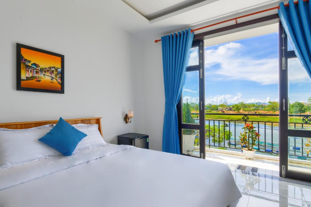 Postel nebo postele na pokoji v ubytování Gió Chiều Homestay - Riverside & Swimming pool
