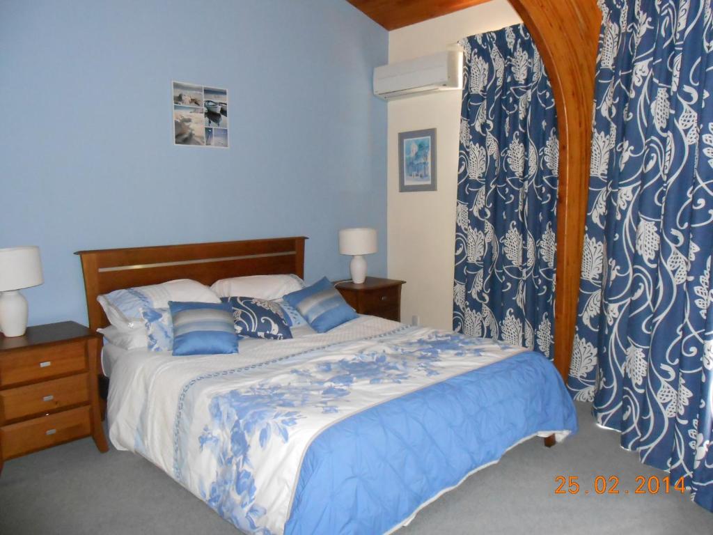 Postel nebo postele na pokoji v ubytování Antares Homestay