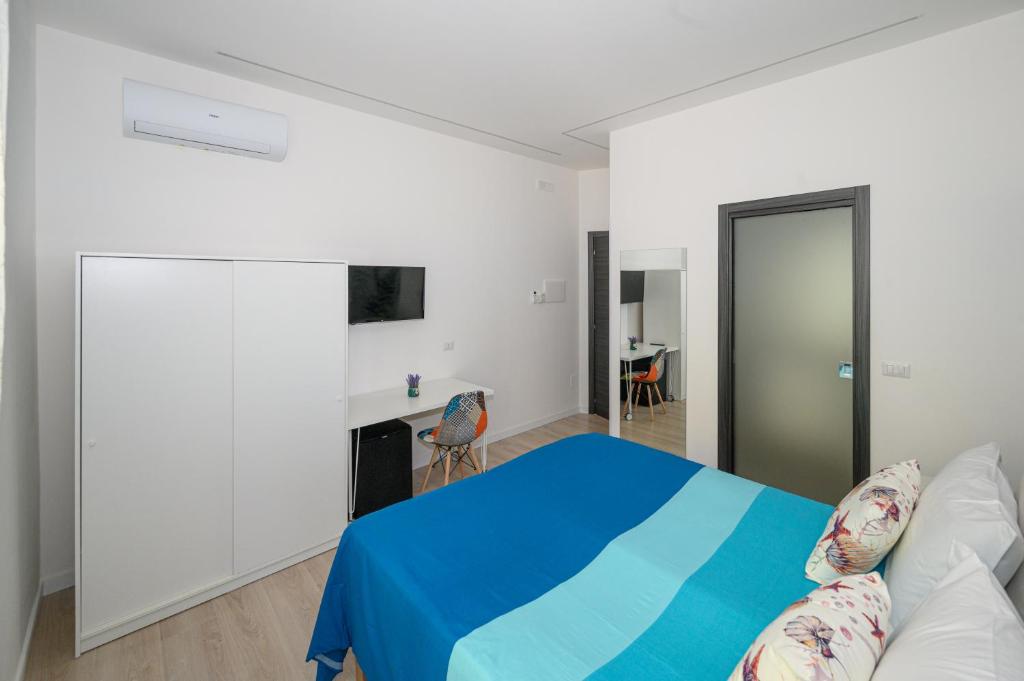 Posteľ alebo postele v izbe v ubytovaní B&B Magia