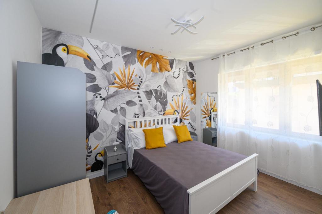 Posteľ alebo postele v izbe v ubytovaní B&B Magia