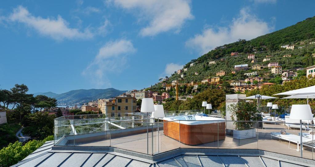 a balcony with a view of a city at Carrick Hotel Camogli Portofino Coast in Camogli
