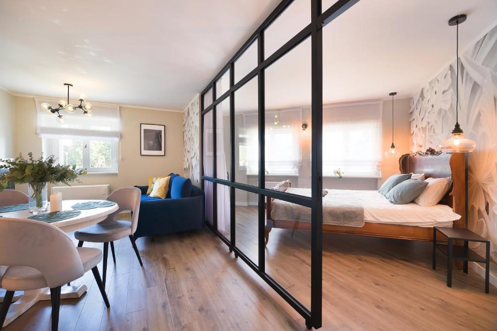 Posteľ alebo postele v izbe v ubytovaní Loft przy Bulwarach