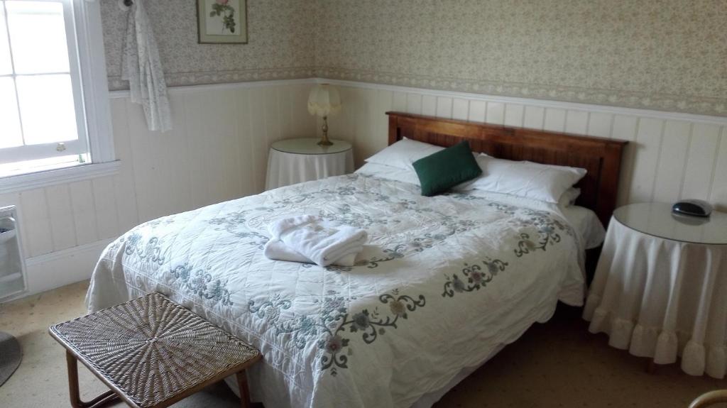 Postel nebo postele na pokoji v ubytování Hillview House Launceston