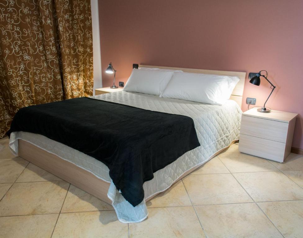 Postel nebo postele na pokoji v ubytování Borgo di Arcadia