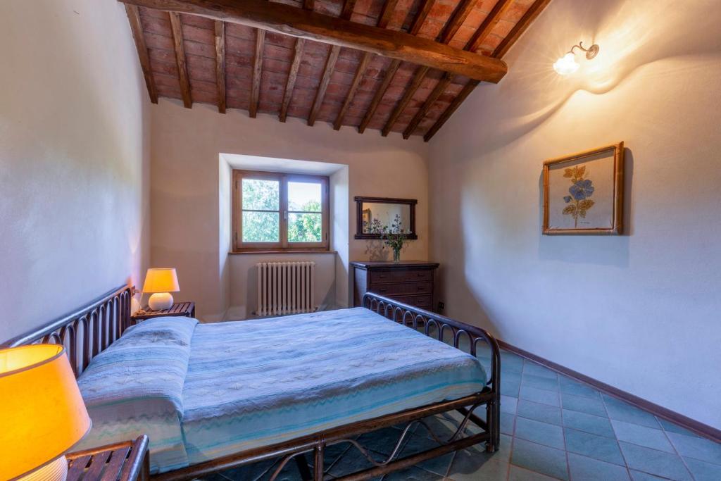 Postel nebo postele na pokoji v ubytování Villa Giarradea