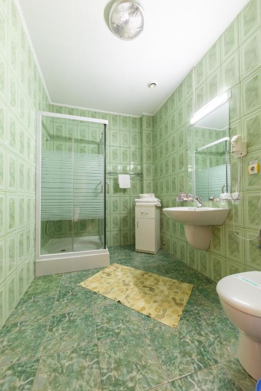 Koupelna v ubytování Hotel Amphitryon