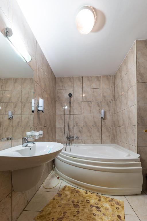 Koupelna v ubytování Hotel Amphitryon