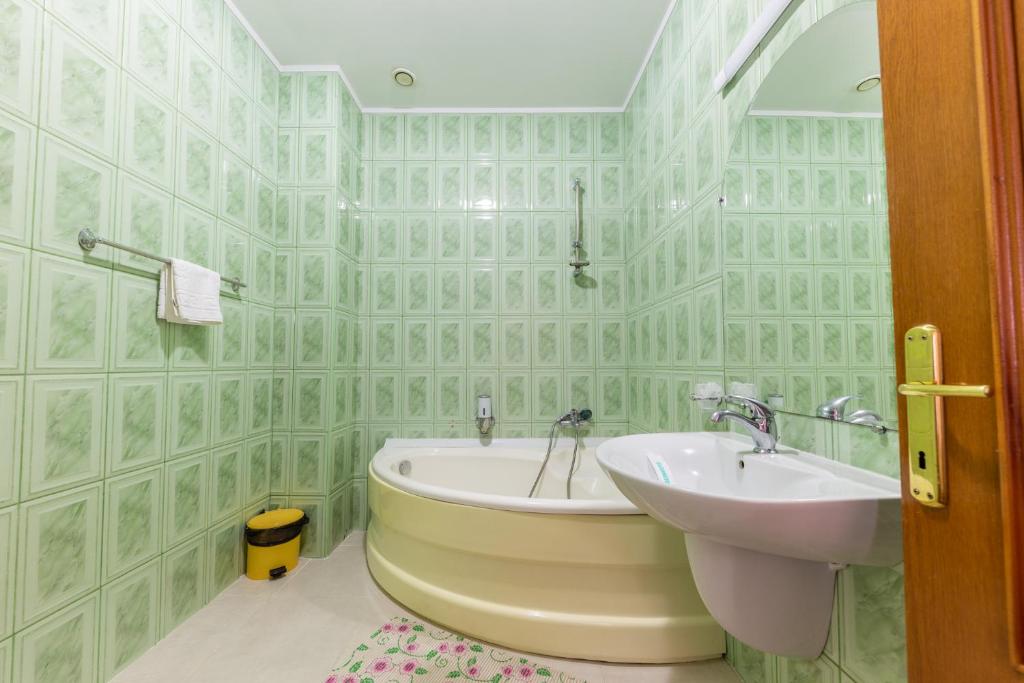 Koupelna v ubytování Hotel Amphitryon