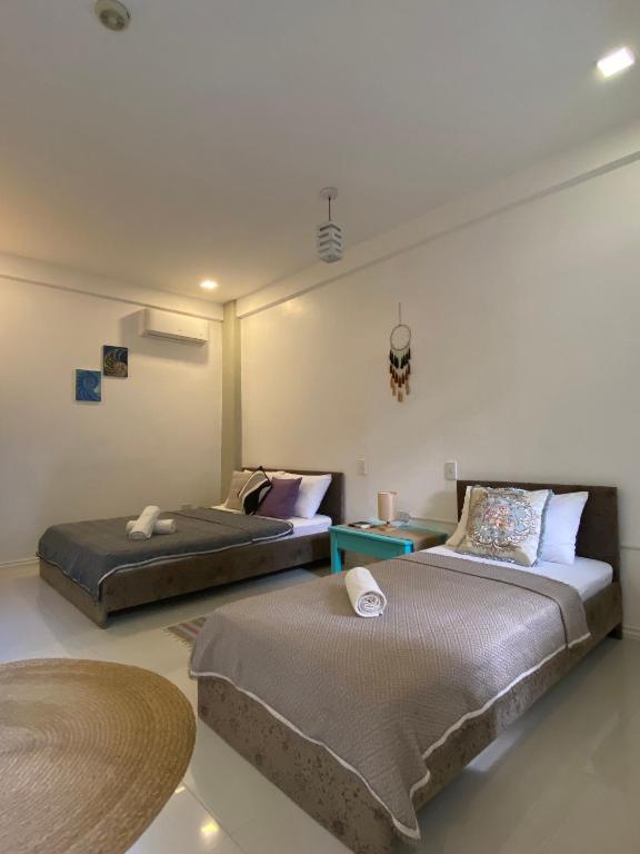 Postel nebo postele na pokoji v ubytování Everrich Boutique Resort Boracay