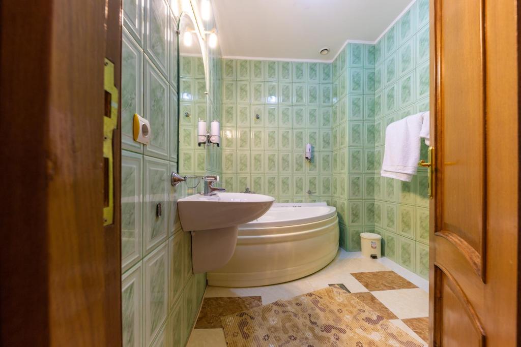 Koupelna v ubytování Hotel Amphitryon