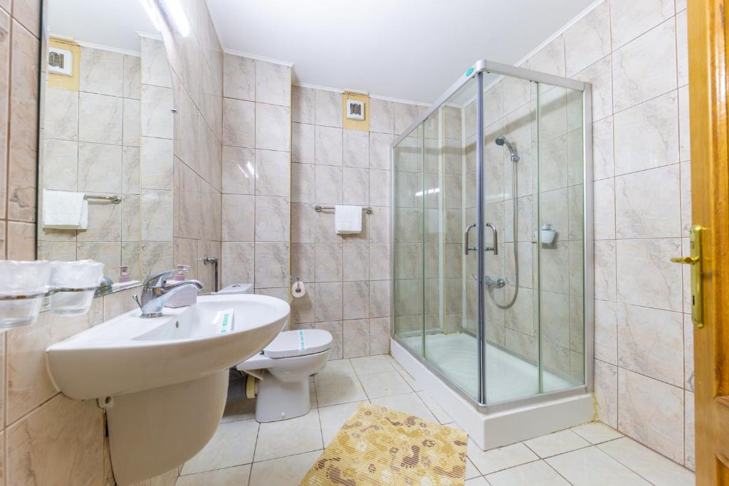 Koupelna v ubytování Hotel Amphitryon