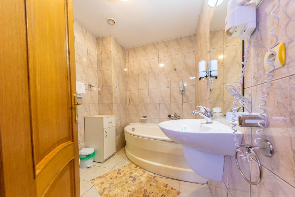 Koupelna v ubytování Hotel Amphitryon