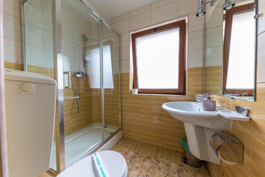 Koupelna v ubytování Hotel Amphitryon