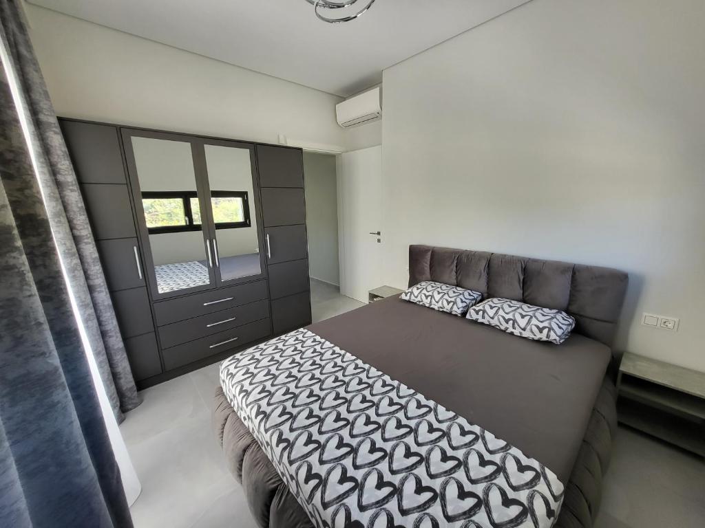 Postel nebo postele na pokoji v ubytování Olea Valley Holiday Villa