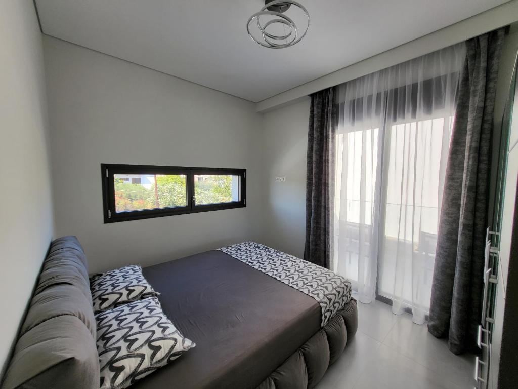 Postel nebo postele na pokoji v ubytování Olea Valley Holiday Villa