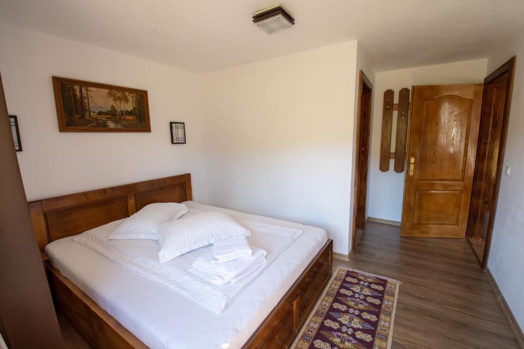 Postel nebo postele na pokoji v ubytování Cabana Denisa