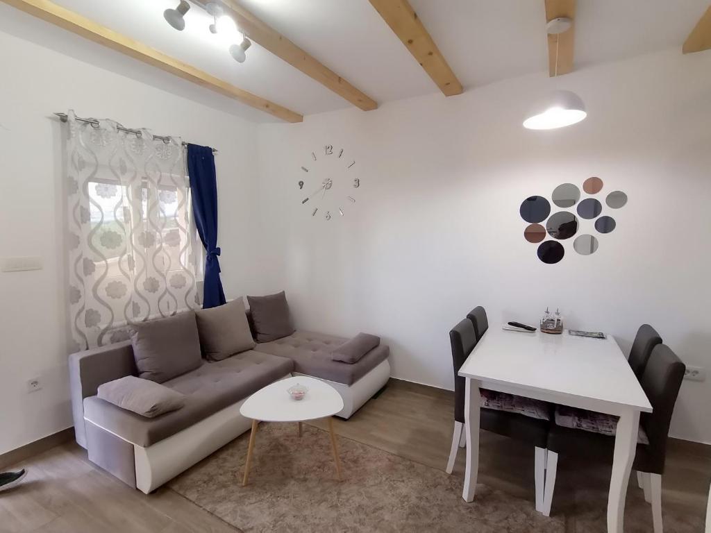 Posezení v ubytování Guest House Dzakovic Stana