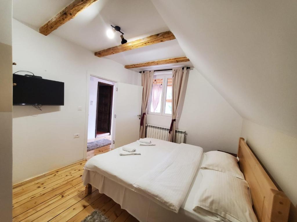 Postel nebo postele na pokoji v ubytování Guest House Dzakovic Stana