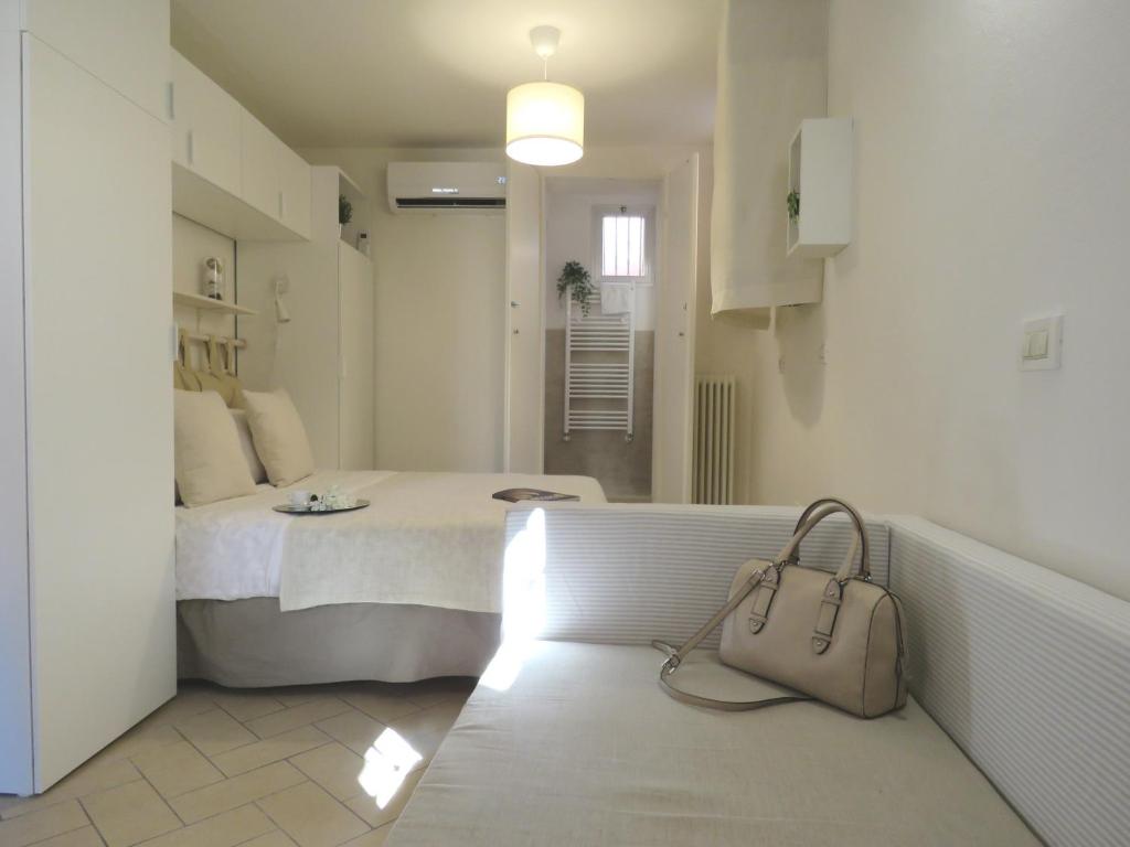 Posteľ alebo postele v izbe v ubytovaní Seta Apartment