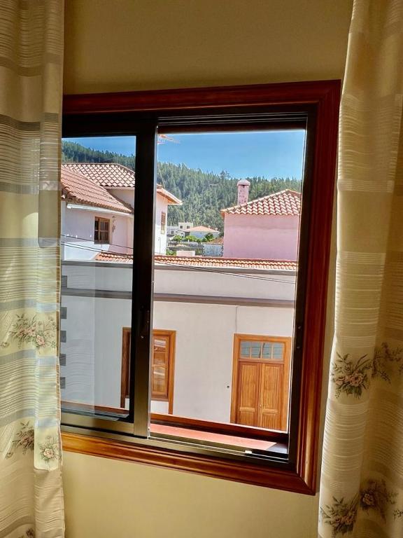 Nespecifikovaný výhled na hory nebo výhled na hory při pohledu z hostelu