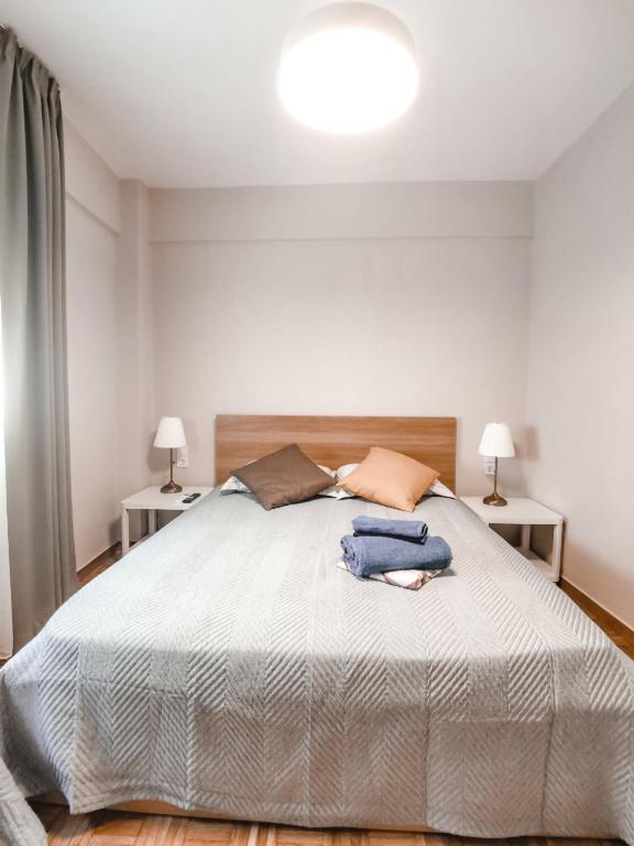 Łóżko lub łóżka w pokoju w obiekcie TIP TOP apartment