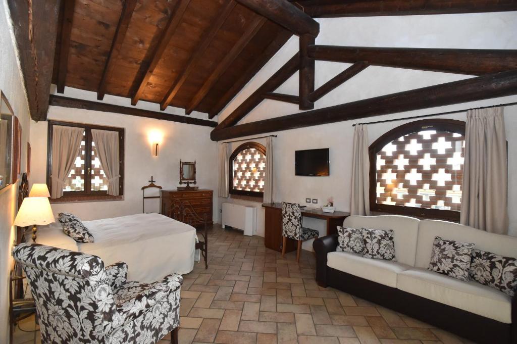 Postel nebo postele na pokoji v ubytování Agriturismo La Camilla