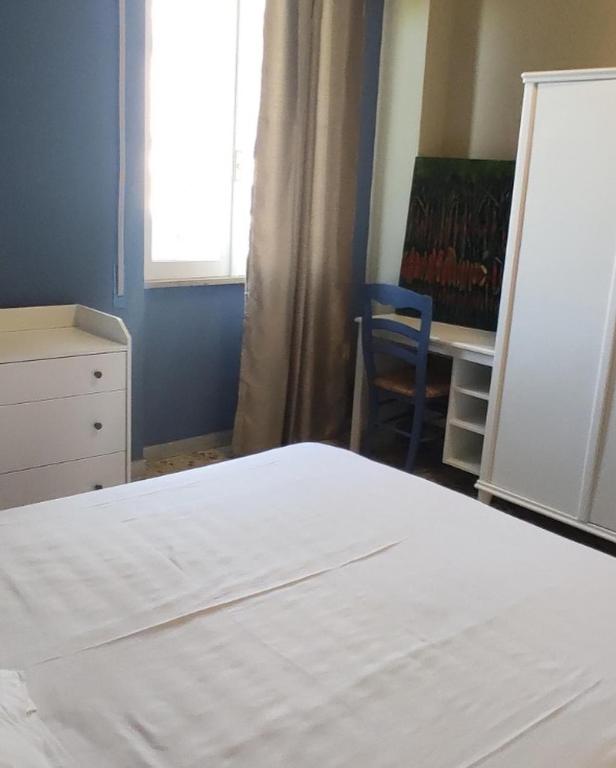 A bed or beds in a room at HS Easy holiday home