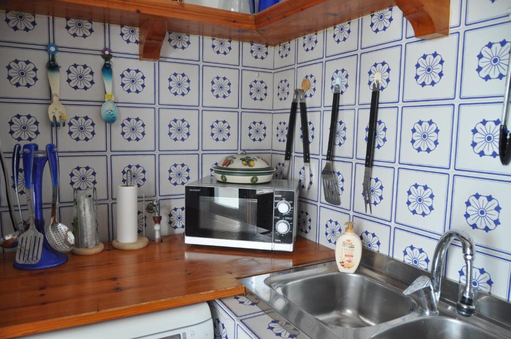 Kuchyň nebo kuchyňský kout v ubytování La casa del Capitano, l'uomo e il mare ...